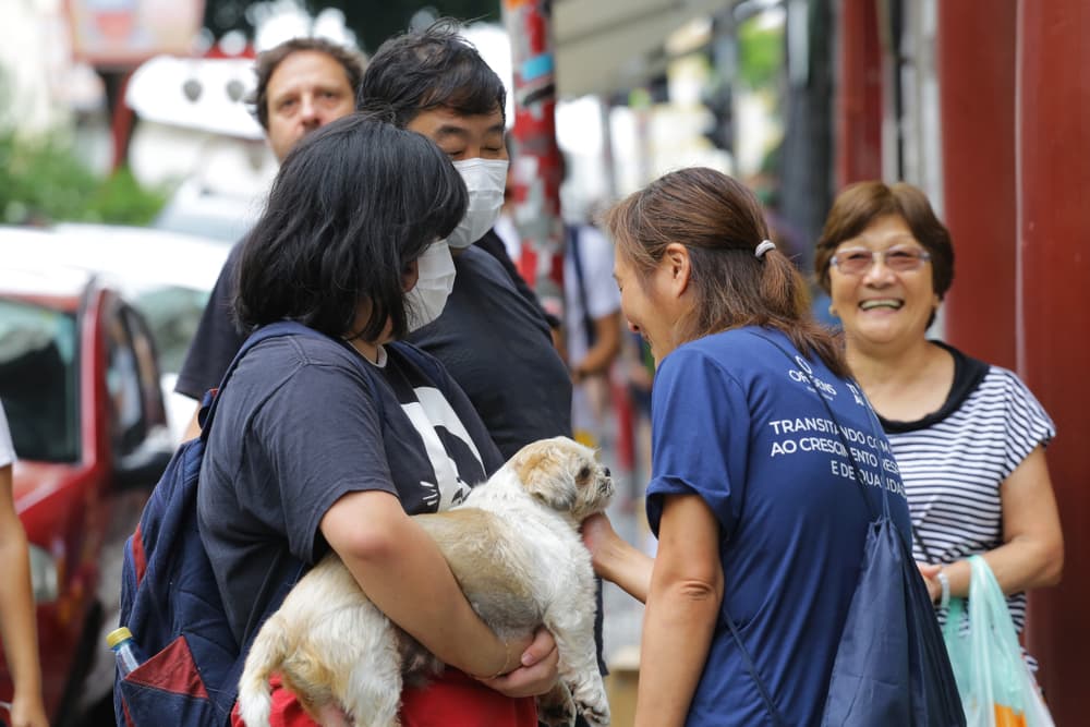 Pet owners wear protective masks