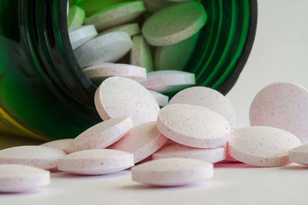 Melatonin supplements on table